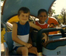 Greg and Chuckie riding the helicopter ride at Milford Frontier Days