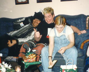 Chuckie, Greg and Jessi opening Christmas Presents